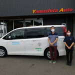 車椅子のまま乗り降りができるようにするためのスロープがついた、ヴォクシーウェルキャブ（トヨタ）の福祉車両